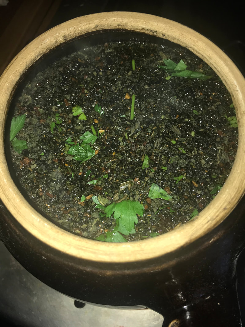 Herbal brew with fresh parsley